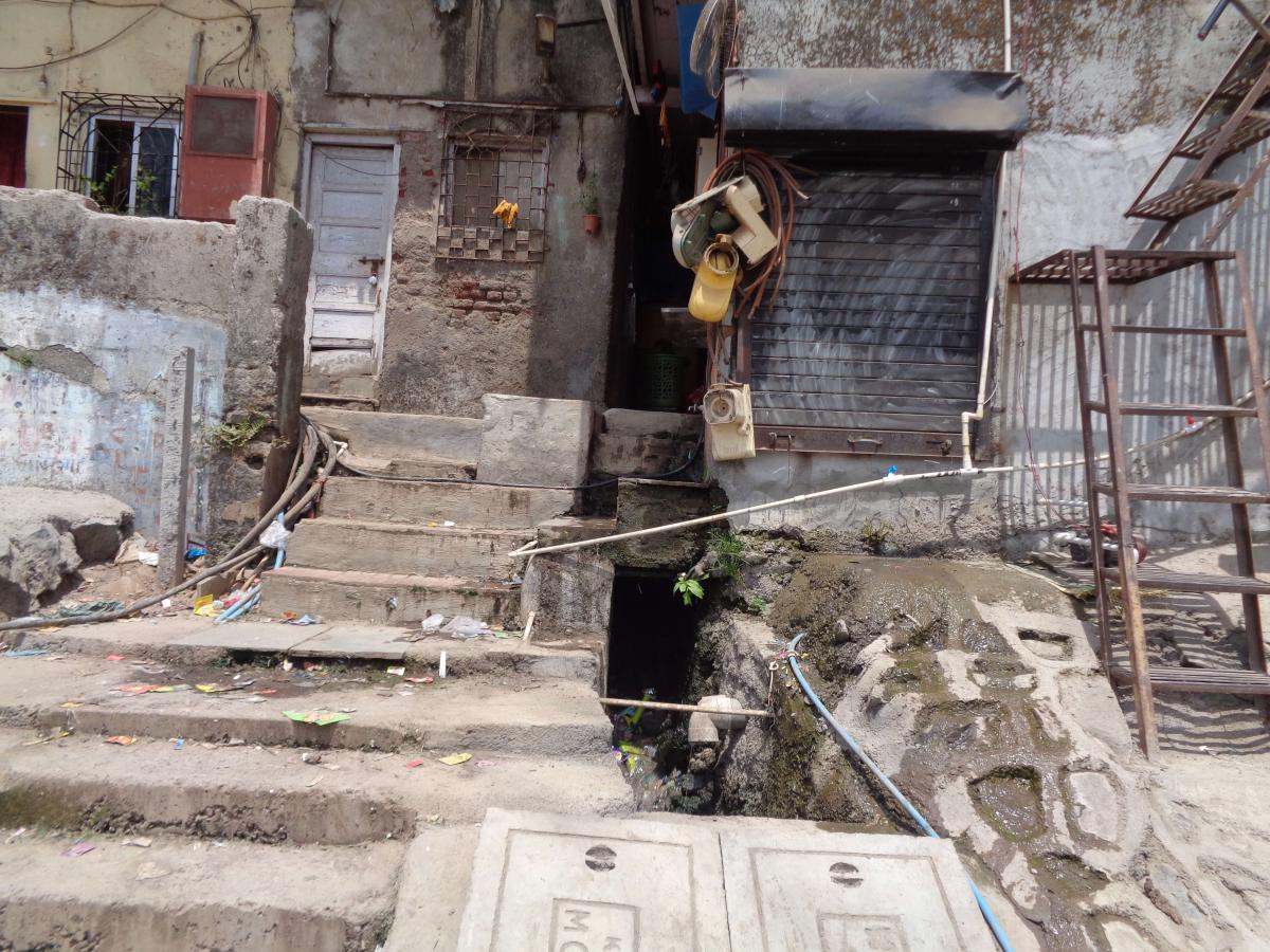 Household wastewater outlet enters a stormwater drain at Gautam Nagar