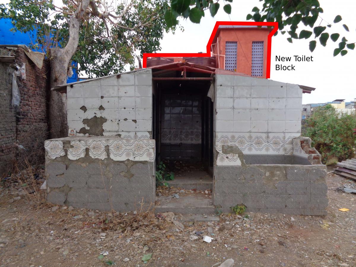 Abandoned community toilet at Shivaji Nagar with a new community toilet right behind (See orange wall)