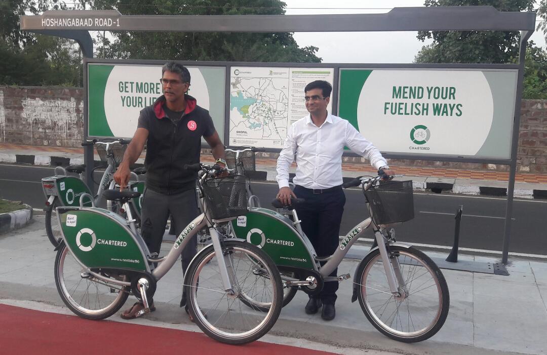 Milind Soman, Model, Actor and Brand Ambassador - India Vision Zero inspects the dedicated cycle track before the launch of PBS in Bhopal.